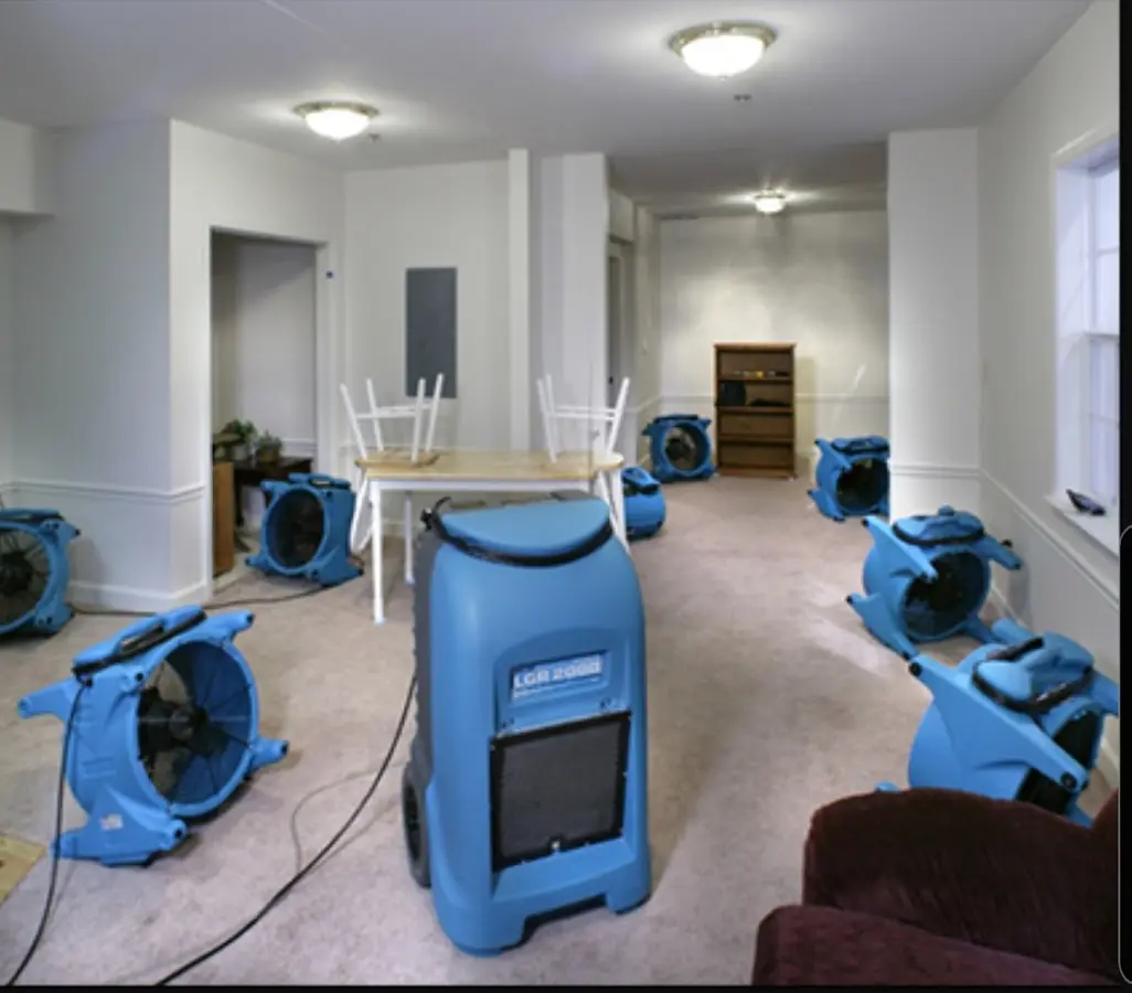 Air movers and dehumidifier setup for Water Damage Restoration in Altoona